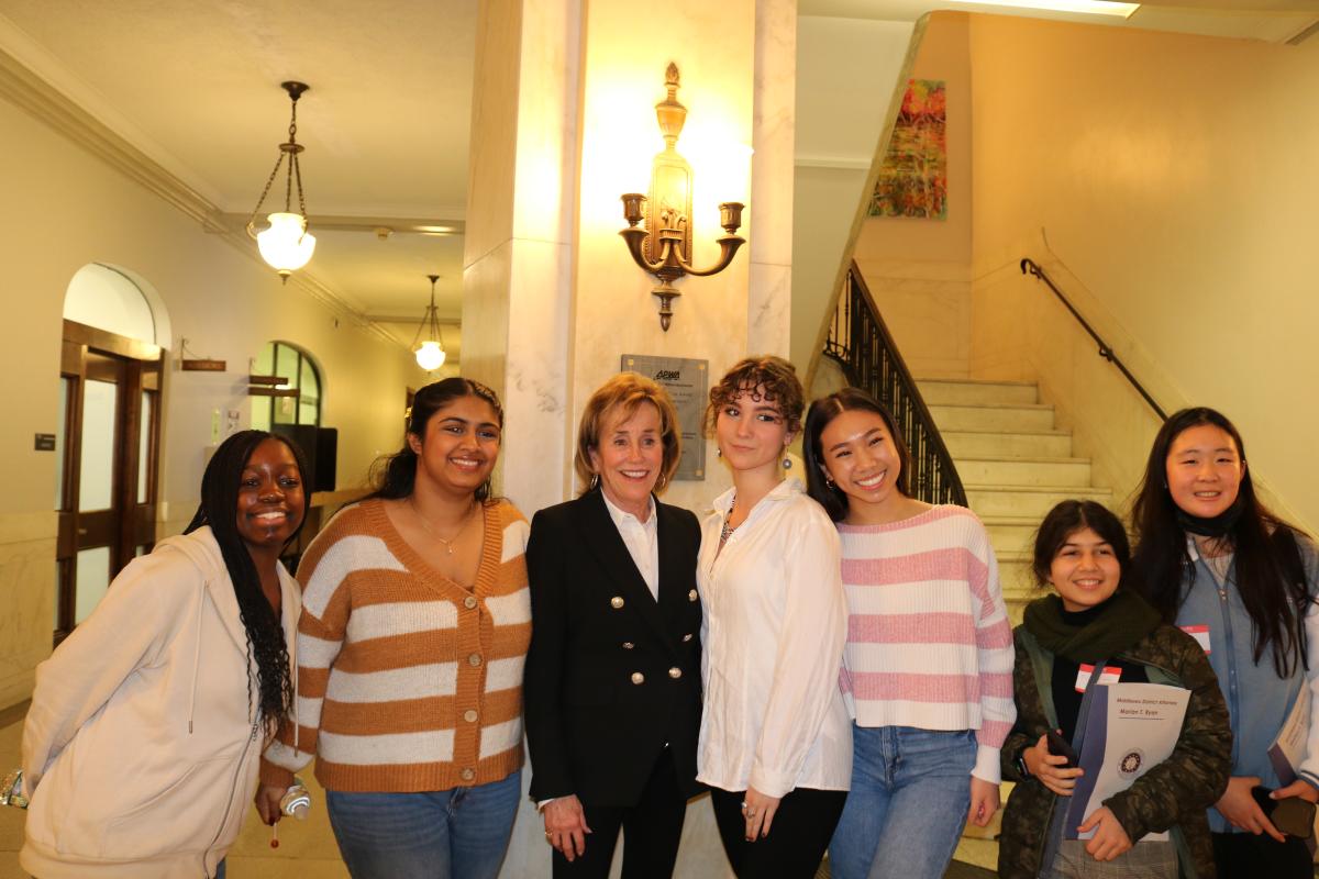 Valerie Biden Owens poses for a photo with students