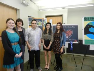 District Attorney Marian Ryan with the student winners of the Poster Project