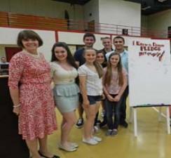 Middlesex District Attorney Marian Ryan with Wakefield High School students who signed the pledge to not text and drive.