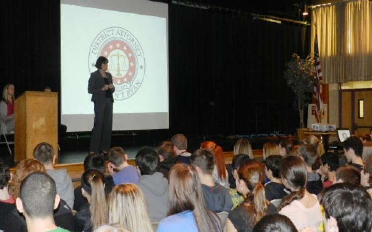 District Attorney Marian Ryan speaks to middle school students in Reading
