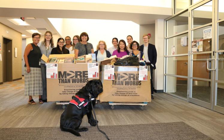 Middlesex District Attorney staff hold book & clothes drive for More Than Words